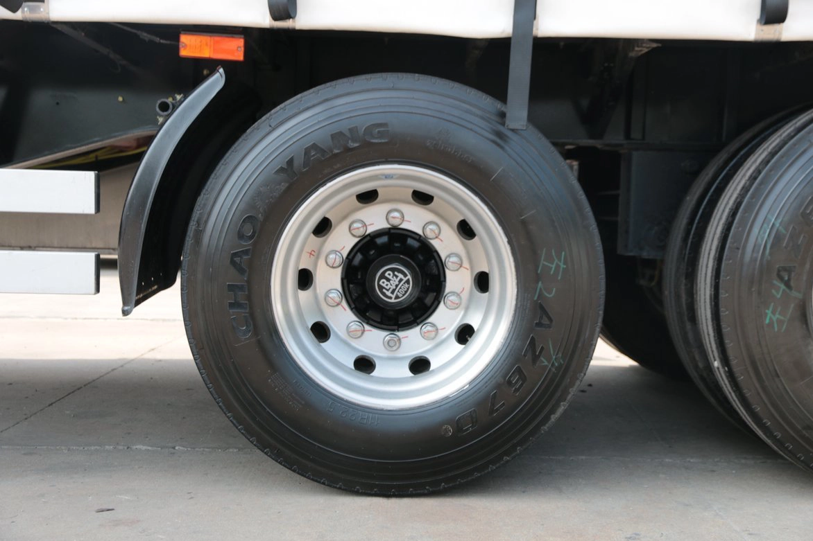 Detail of premium BPW axles and aluminum alloy rims on Kales 13M Curtainsider semi-trailer.