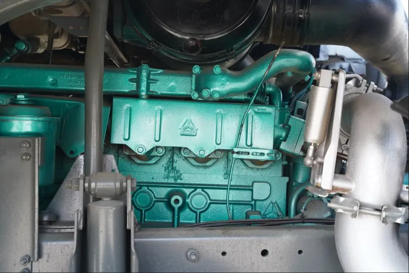 Sinotruk WD615 heavy-duty diesel engine cylinder block and intake piping on refurbished HOWO 6x4 dump truck