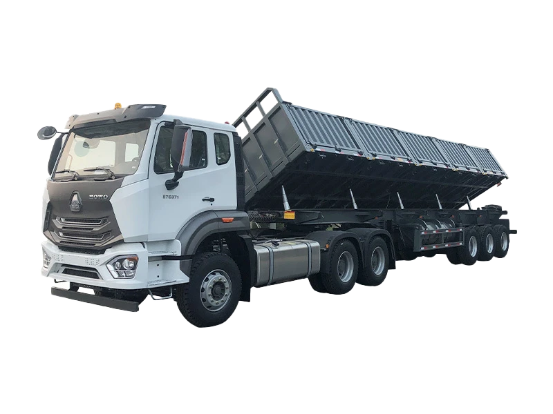 Kales side tipper trailer unloading construction material on site