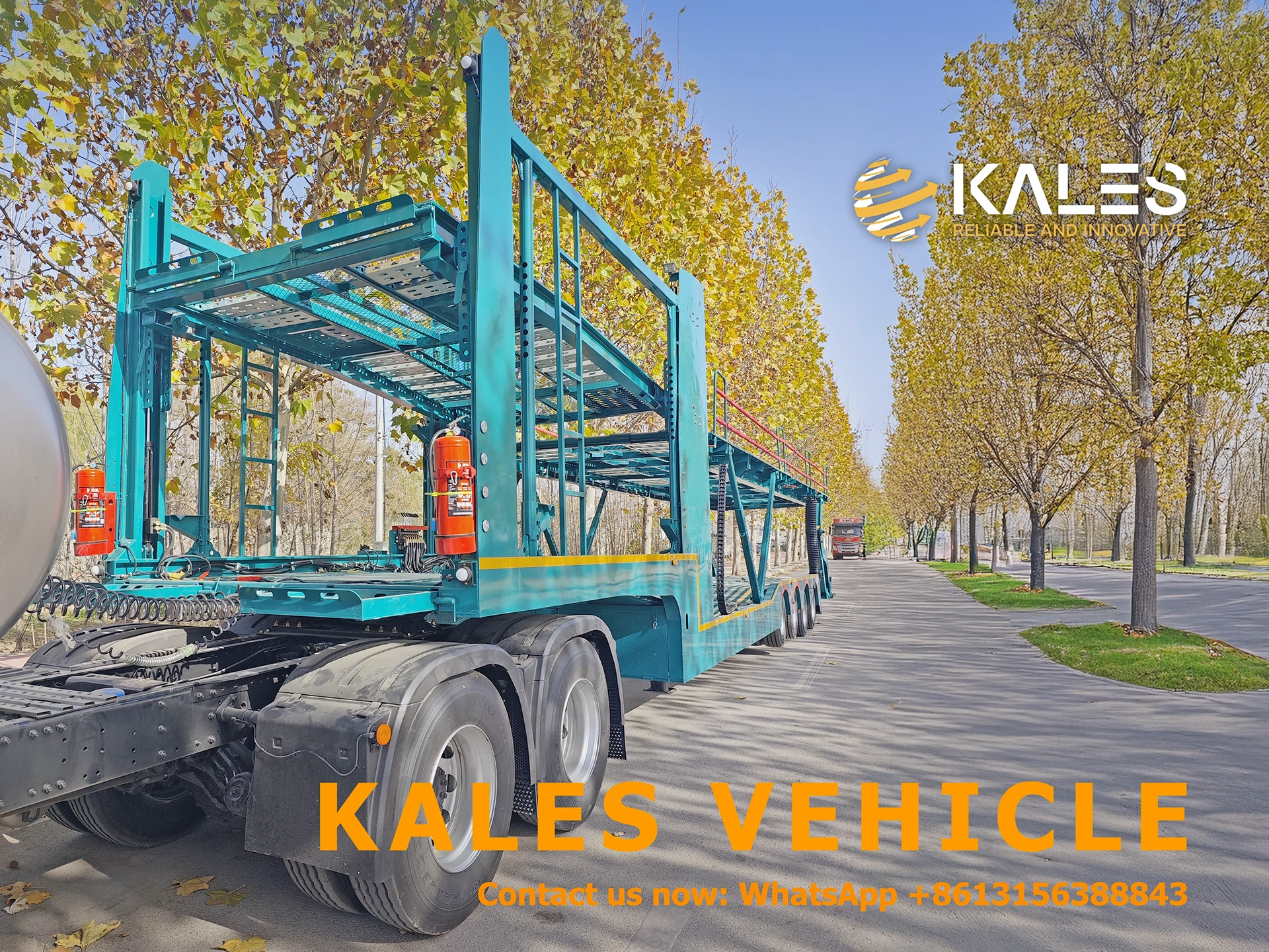Front view showing double deck structure capable of loading commercial trucks and containers