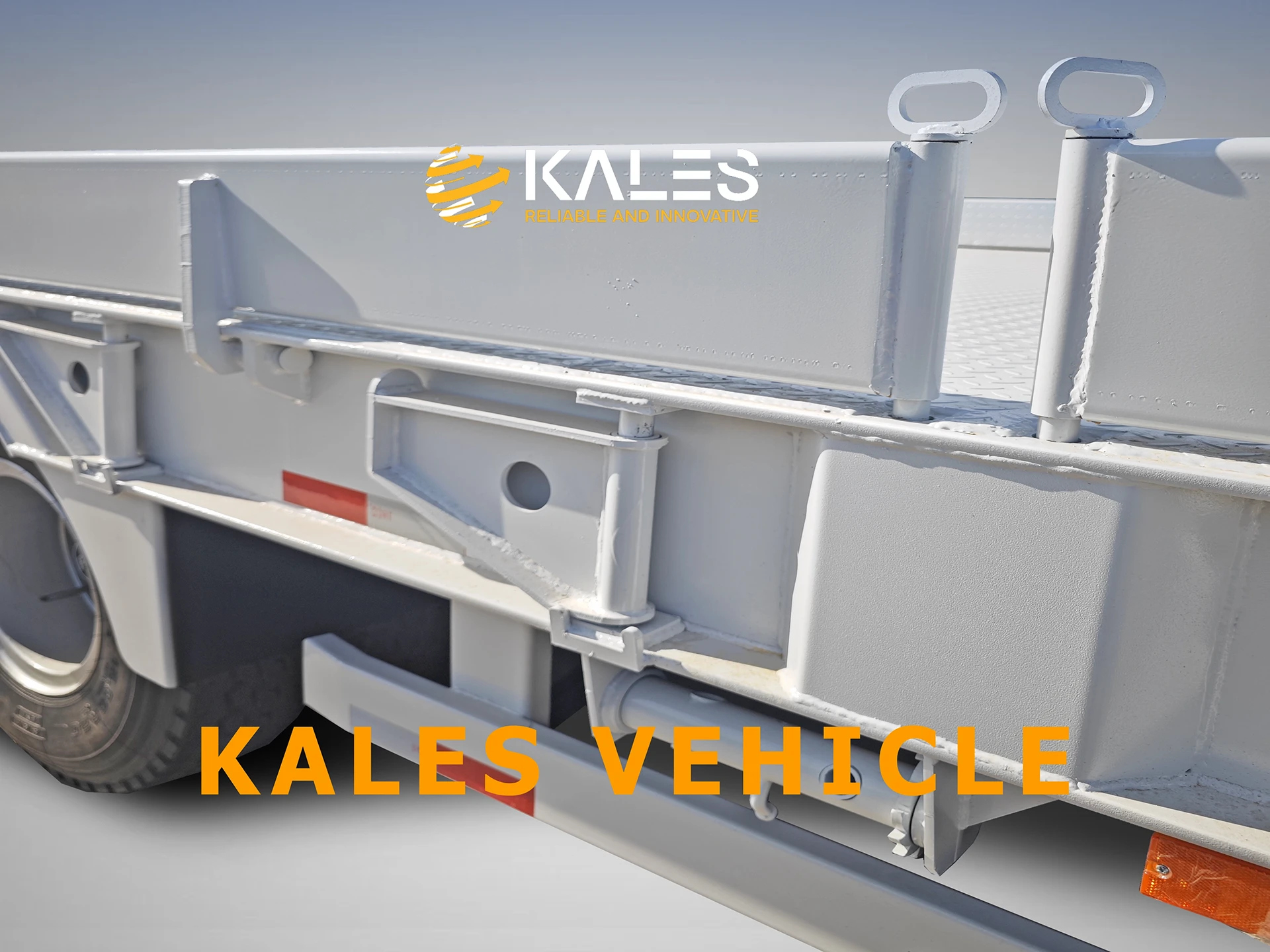 Side extension swing brackets and detachable drop sides on Kales 3-axle 80 ton lowbed trailer.